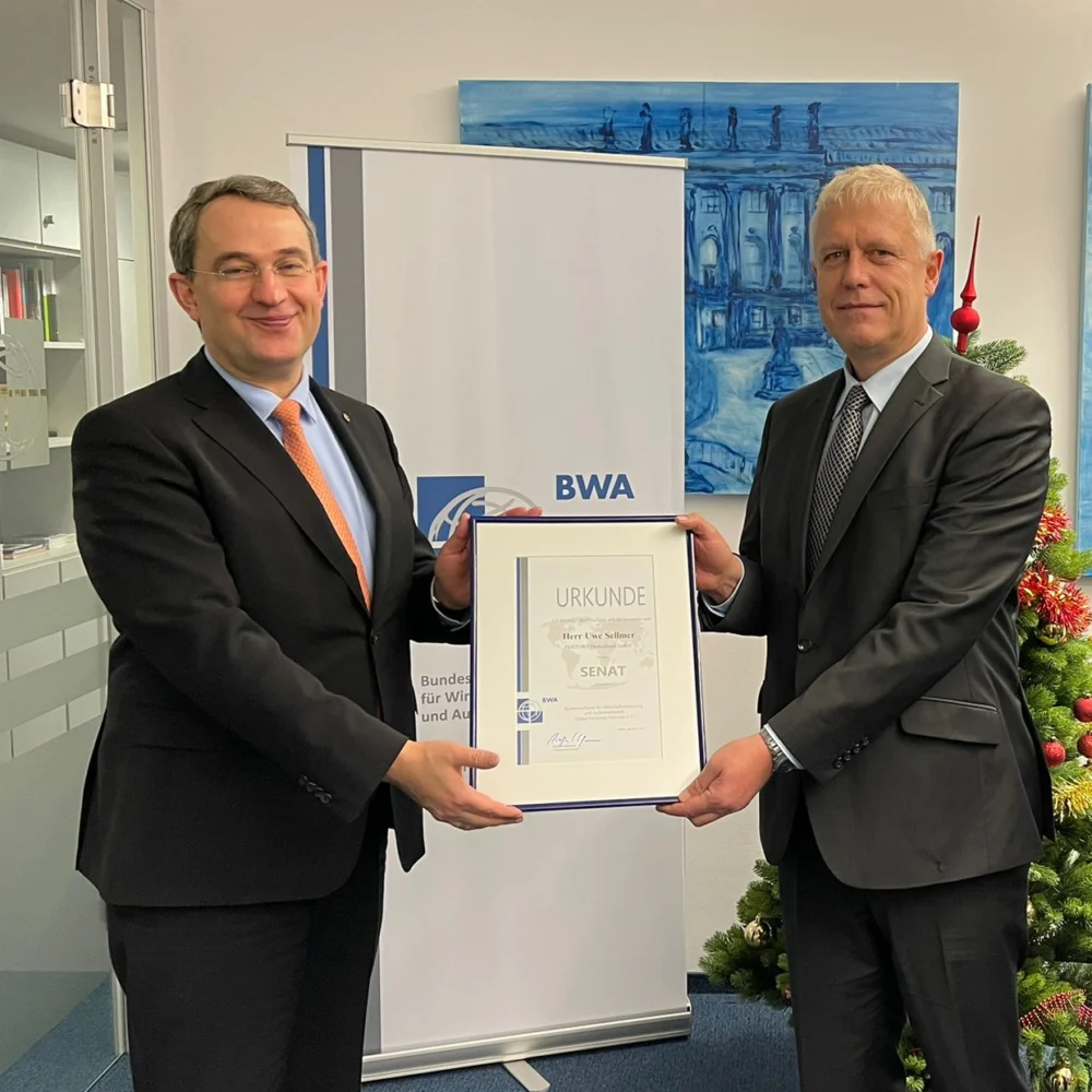 Uwe Sellmer receiving his appointment to the BWA Senate from Michael Schumann, Chairman of the BWA